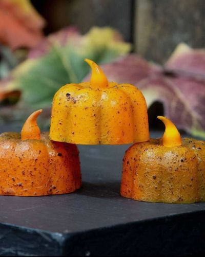 Grungy pumpkin tealights lumini di zucca primitive rivestite in cera