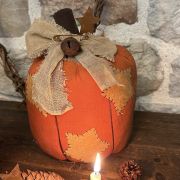Zucca autunnale in tessuto americano primitive e stelle patchwork